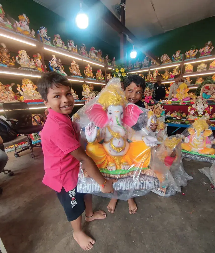 Families celebrating with Devta Bappa