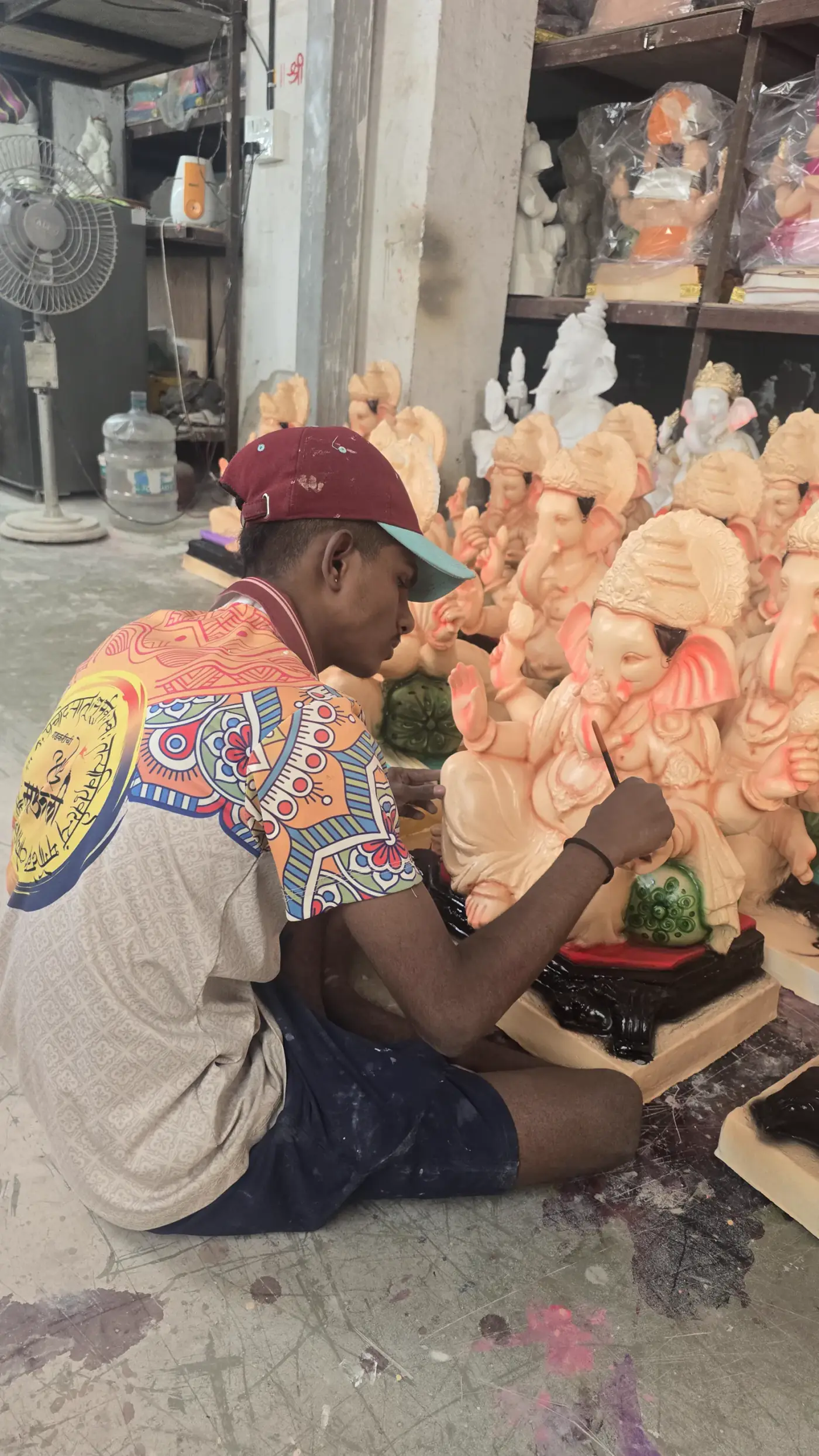 Devta artisans working on a batch of decorated eco-friendly Ganesha idols